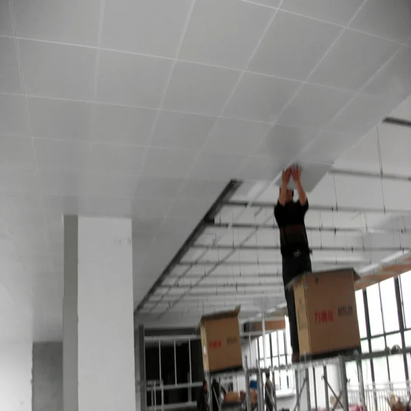 Metal microporous ceiling tiles